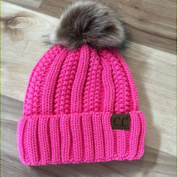 C.C Accessories - C.C cable knit faux fur bauble hat. New never worn. Beautiful color